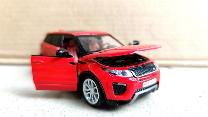 Машинка металлическая Рендж Ровер Range Rover Evoque со светом и звуком открываются двери, капот 1:32