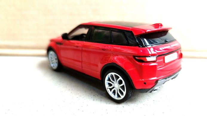 Машинка металлическая Рендж Ровер Range Rover Evoque со светом и звуком открываются двери, капот 1:32