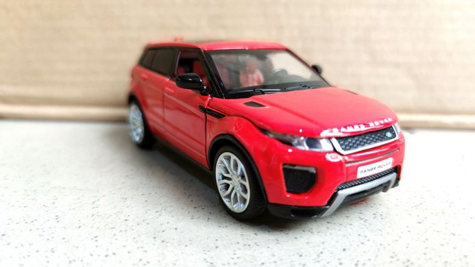 Машинка металлическая Рендж Ровер Range Rover Evoque со светом и звуком открываются двери, капот 1:32